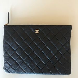 Chanel O case clutch
